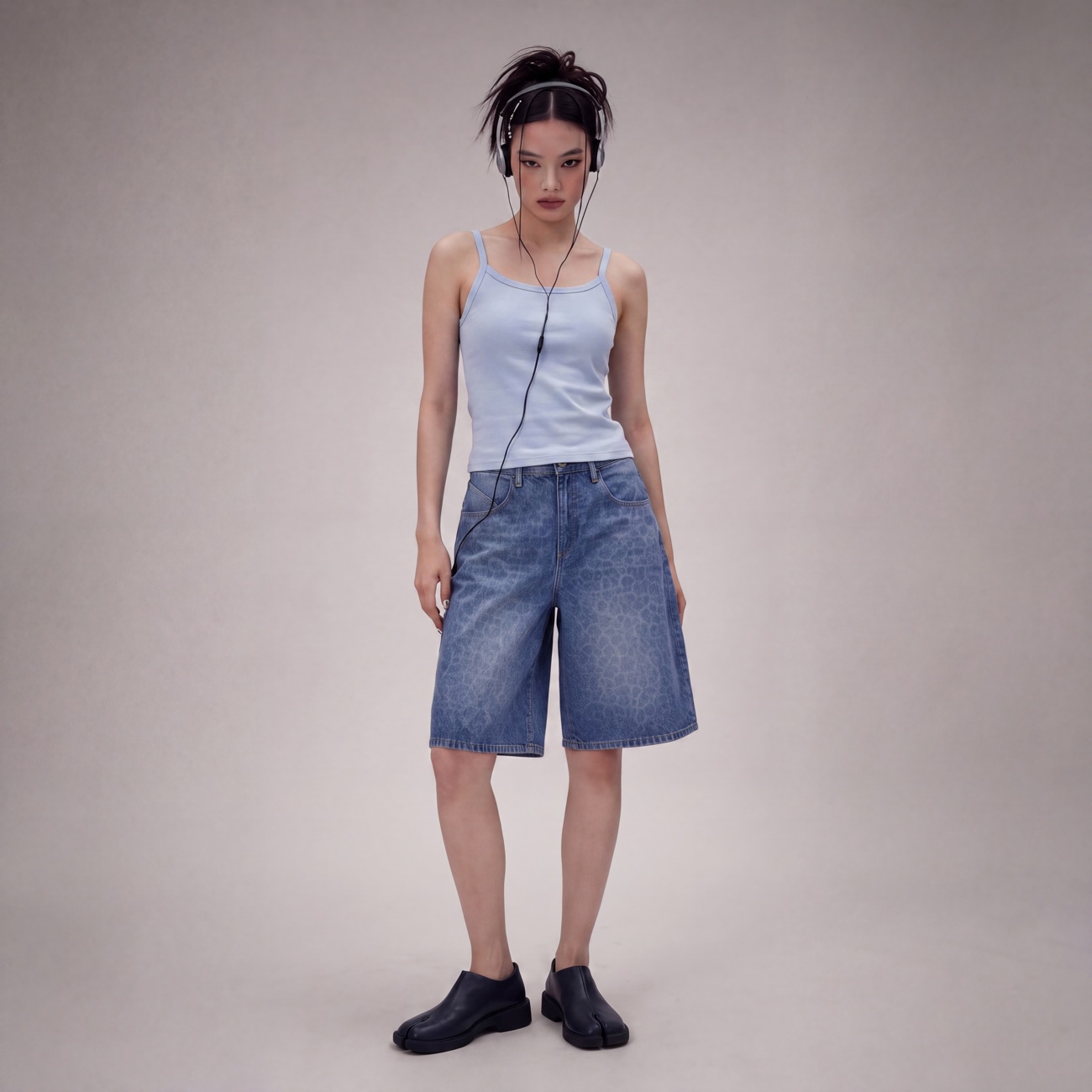 NOIR 2026 Lookbook — blue leopard-wash jorts studio look
